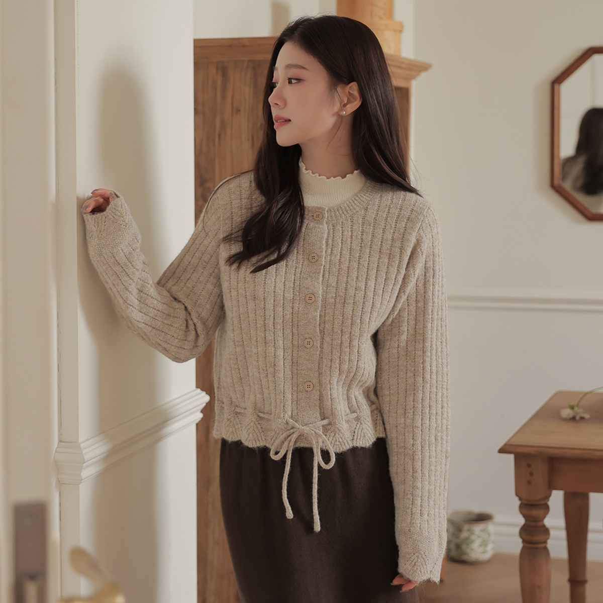 Soft washing string button knit